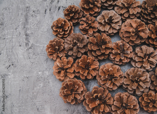 Pinecones on stone background. Christmas decorations. 