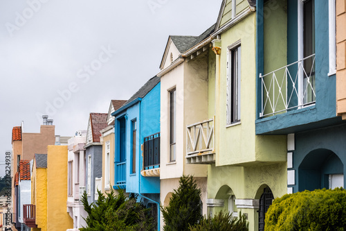 Street view of rows of houses in one of the San Francisco's residential neighborhoods, California