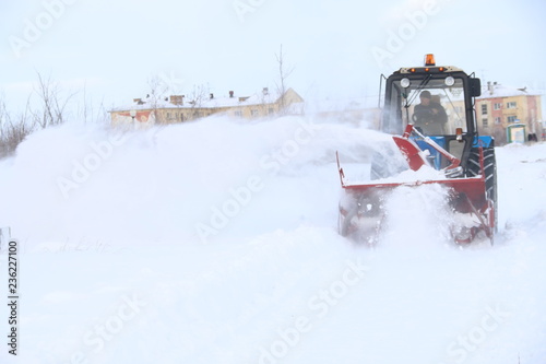 snowplow clearing roads of snow. tractor remove snow from city