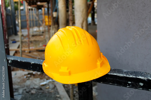 Building, Safety Works: Hard Hat, Construction Hat Helmet. Background for construction worker or engineer helmet - Construction Site photo