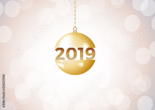 2019 Happy New Year ball on iridescent glitter festive empty background. Shiny sparkles swirling in air.