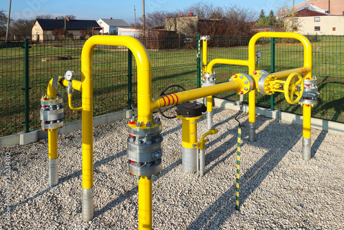 Element gas line high and medium pressure. Yellow transport pipes on the surface of the fence. Regulatory supply system for natural compressed fuel. Access overlap valves and pressure sensors.