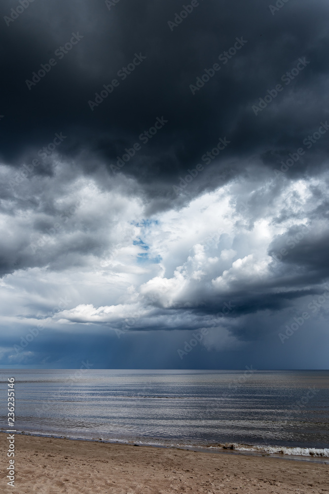 Obraz premium Stormy clouds over gulf of Riga, Baltic sea.