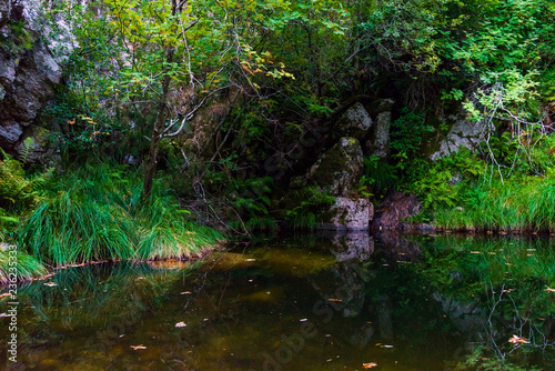 Waterfall in Manteigas Town  Serra da Estrela or Mountain of Star in Portugal called Poco do Inferno or Hell Pit.