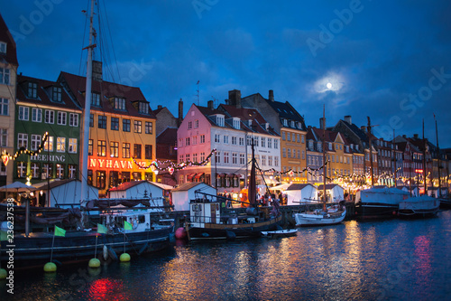 The Nyhavn harbor district at night in Copenhagen, Denmark