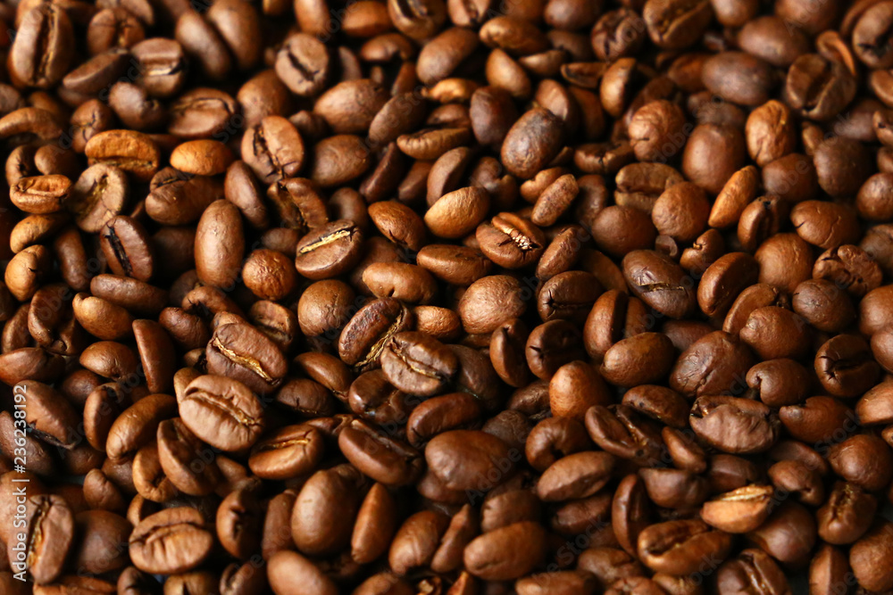 Dark roasted coffee beans. Natural coffee background