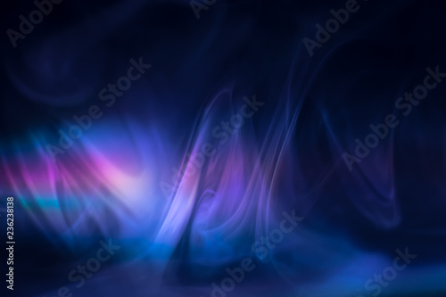 purple, blue, pink smoke (evaporation) on a black background