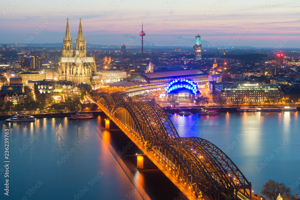 Fototapeta premium Image of Cologne with Cologne Cathedral during twilight blue hour in Germany.