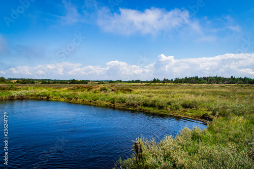 landscape with lake and blue sky