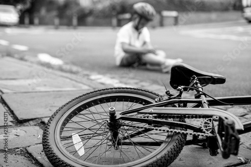 Young boy knocked off his bike