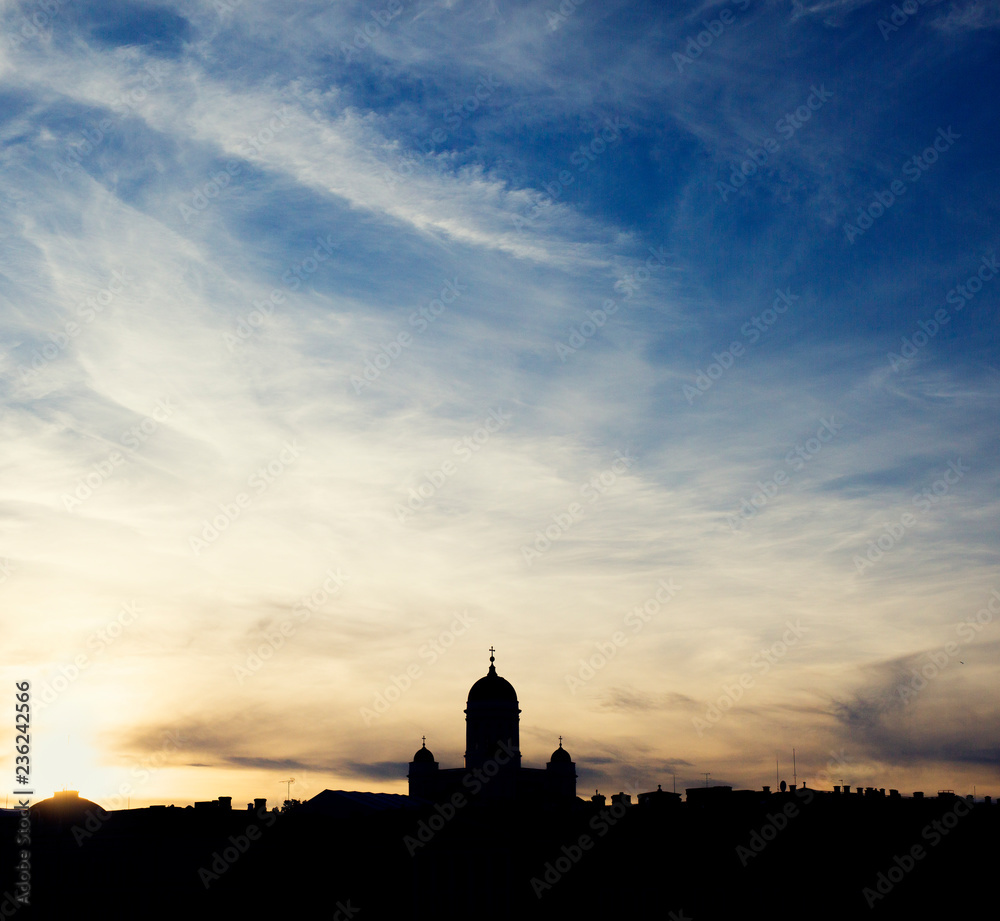 Clouds over silhouette of Helsinki Cathedral, Finland Clouds over silhouette of Helsinki Cathedral, Finland