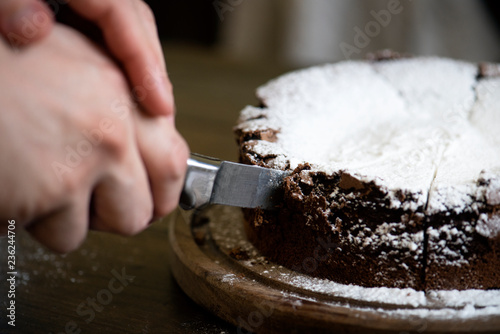 Patisserie slicing chocolate fudge cake photography recipe idea