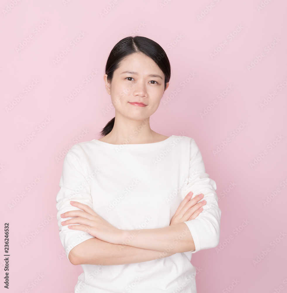 Asian female on pink background Asian female on pink background