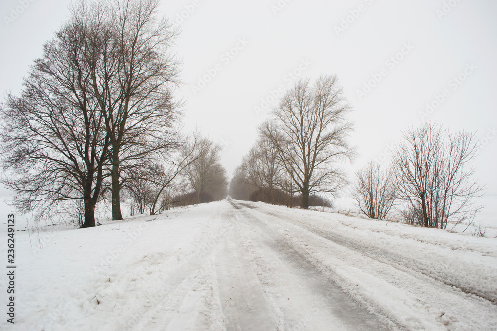 Snowy weather on the empty road, danger, winter. Snowy weather on the empty road, danger, winter.