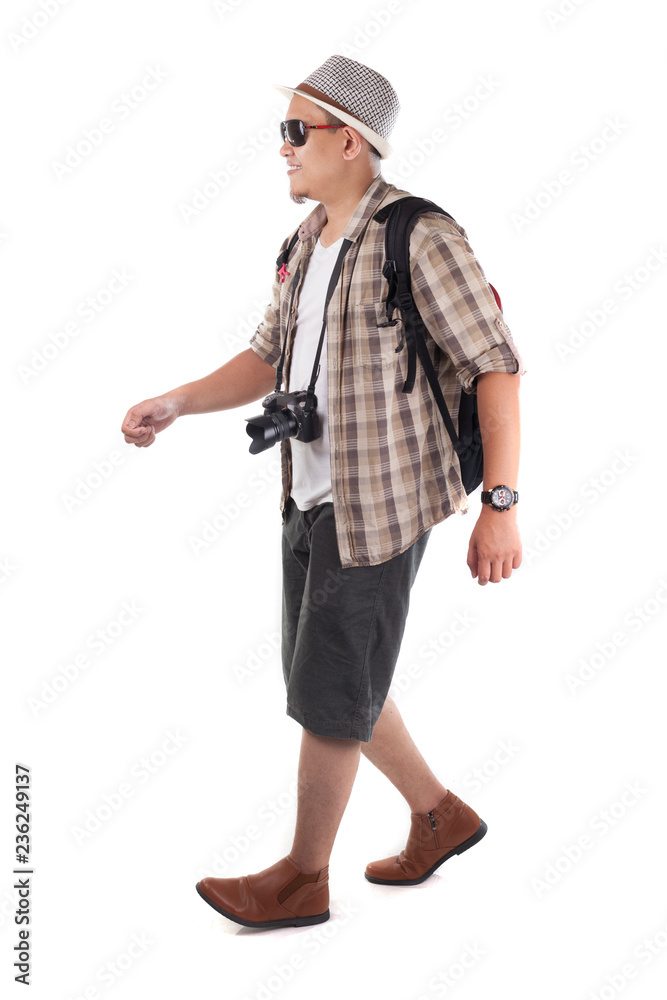 Traveling People Isolated on White. Male Backpacker Tourist Walking Side View Traveling People Isolated on White. Male Backpacker Tourist Walking Side View