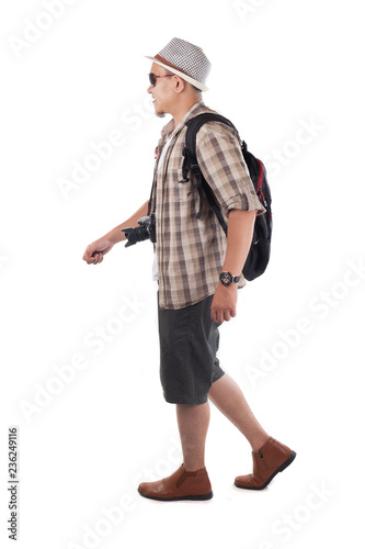Traveling People Isolated on White. Male Backpacker Tourist Walking Side View
