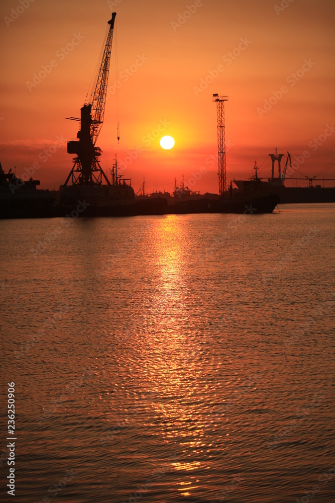 Seaport at sunset