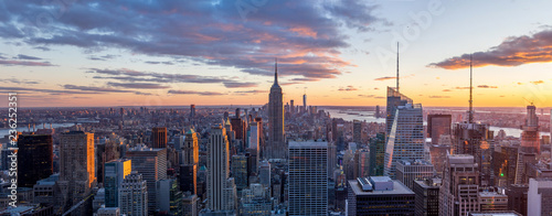 Amazing panorama view of  New York city skyline and skyscraper at sunset. Beautiful night view in Midtown Manhatton.