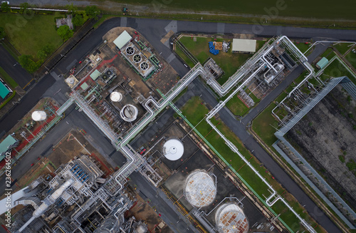 Top view of Industrial at oil refinery plant form industry zone ,which factory  as  a petrochemical plant, Shot from drone of Oil refinery,evening scenery.