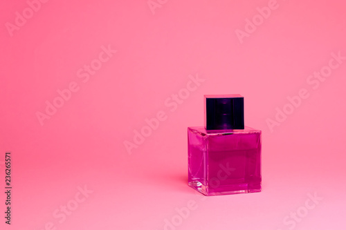 Pink women bag isolated on a pink background. Fashion and glamour concept