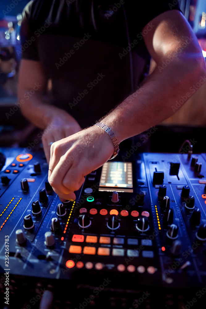 Dj playing disco house progressive electro music at the concert Dj playing disco house progressive electro music at the concert