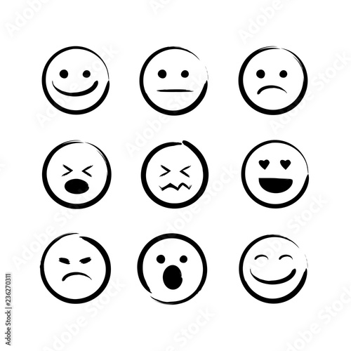 vector illustration set of hand drawn emojis faces. Doodle emoticons, ink brush icon on a white background. photo