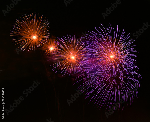 Colorful amazing fireworks isolated in dark background close up with the place for text  Malta  fireworks festival  4 of July  Independence day  New Year  explode