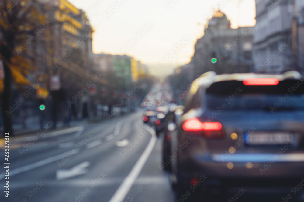 Car driving on road, blur travel background