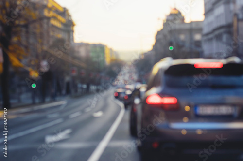 Car driving on road, blur travel background