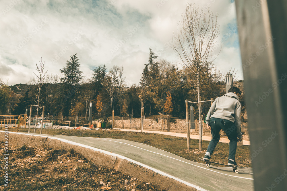 Guy skateboarding in a park Guy skateboarding in a park