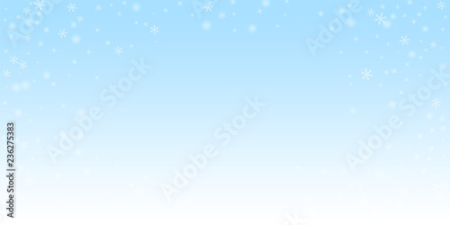 Sparse glowing snow Christmas background. Subtle f