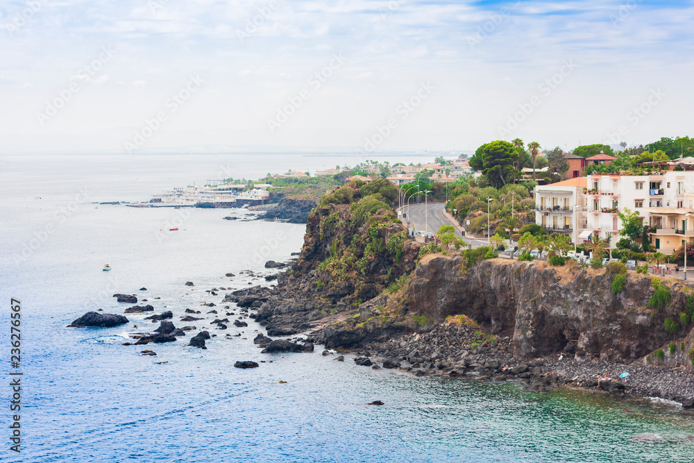 Cityscape of Acitrezza, view from the sea side of Acicastello, Catania, Sicily