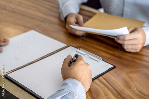 Insurance or loan real estate, Agent broker and client signing contract agreement approved to buy property had passed the examination