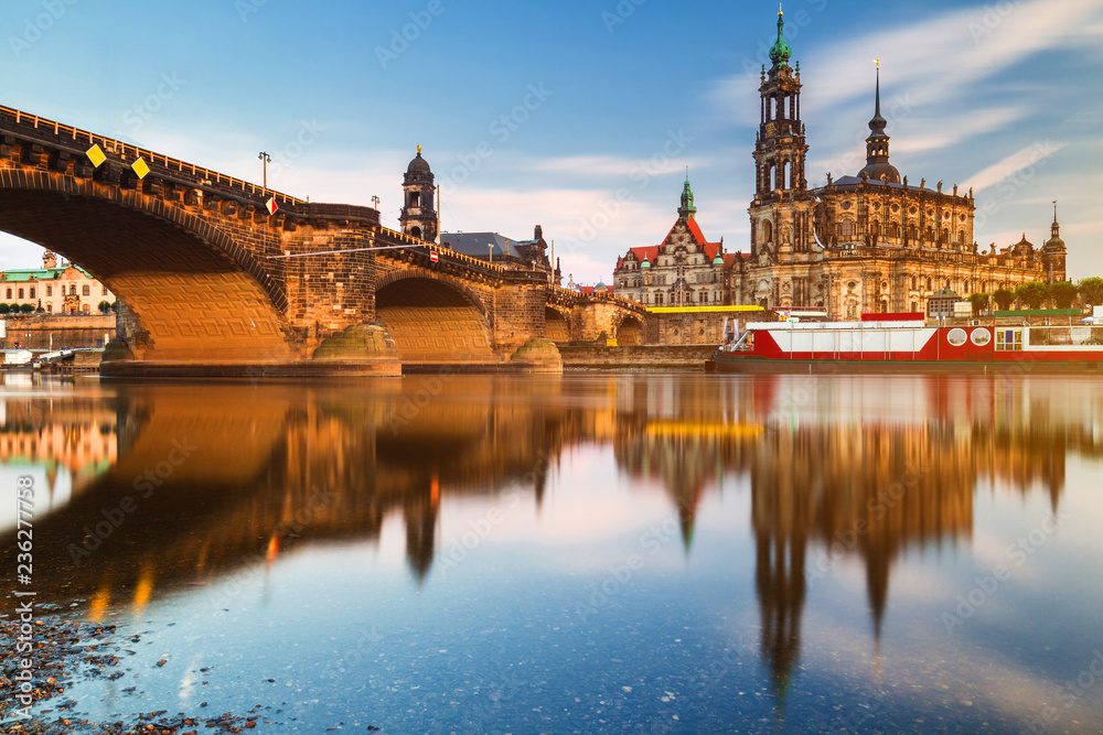 Augustus Bridge (Augustusbrucke) and Cathedral of the Holy Trinity (Hofkirche) over the River Elbe in Dresden, Germany, Saxony.