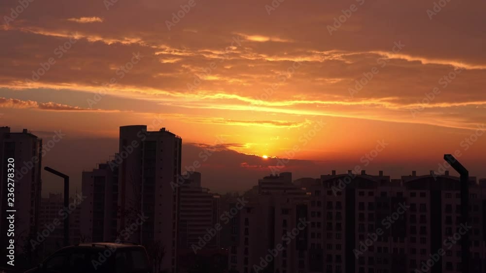 Timelapse sunset on the cloudy sky over city, Turkey, Istanbul Timelapse sunset on the cloudy sky over city, Turkey, Istanbul