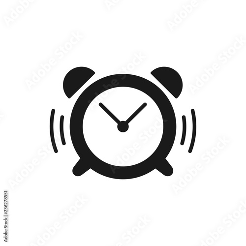 Black isolated icon of ringing alarm clock on white background. Silhouette of alarm clock. Flat design.