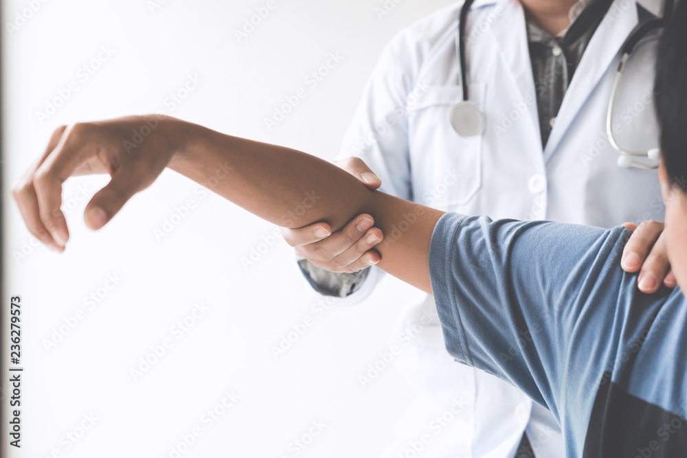 Doctor checking patient with elbow to determine the cause of illness