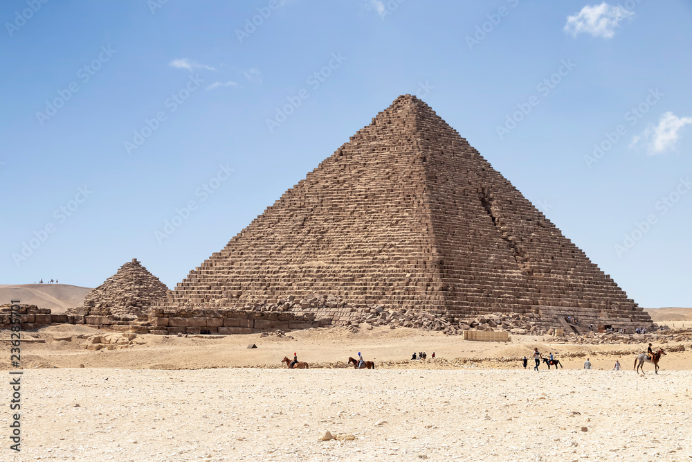 The Pyramid of Menkaure is the smallest of the three main Pyramids of Giza, located on the Giza Plateau in the southwestern outskirts of Cairo, Egypt. The Pyramid of Menkaure is the smallest of the three main Pyramids of Giza, located on the Giza Plateau in the southwestern outskirts of Cairo, Egypt.