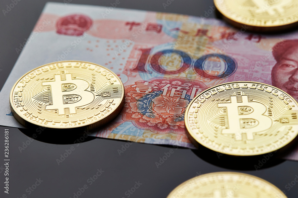 Bitcoin with Chinese banknotes Bitcoin with Chinese banknotes