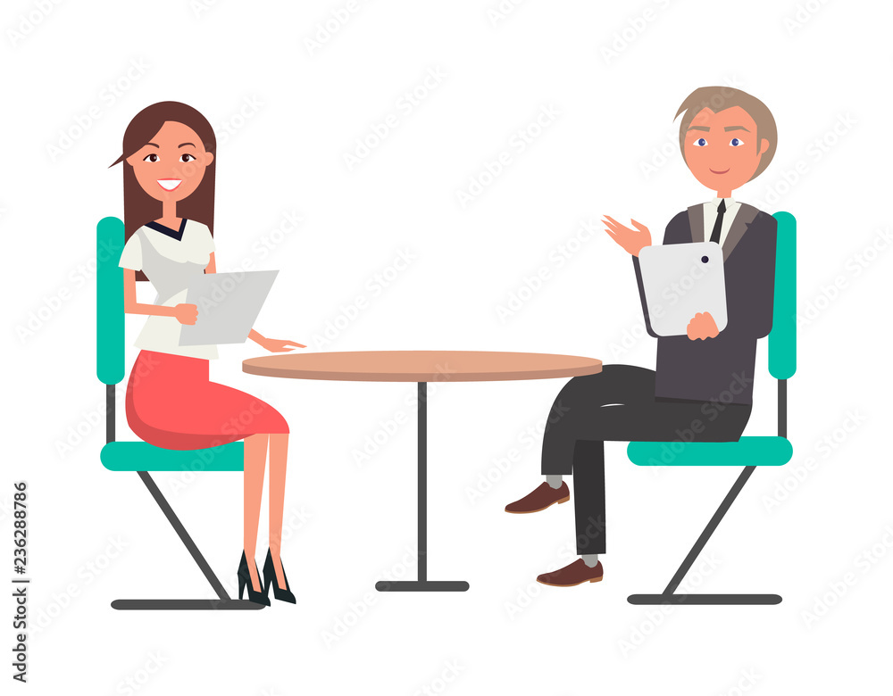 Man and Woman on Business Meeting at Round Table Man and Woman on Business Meeting at Round Table