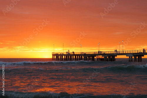 pier in a red sunset