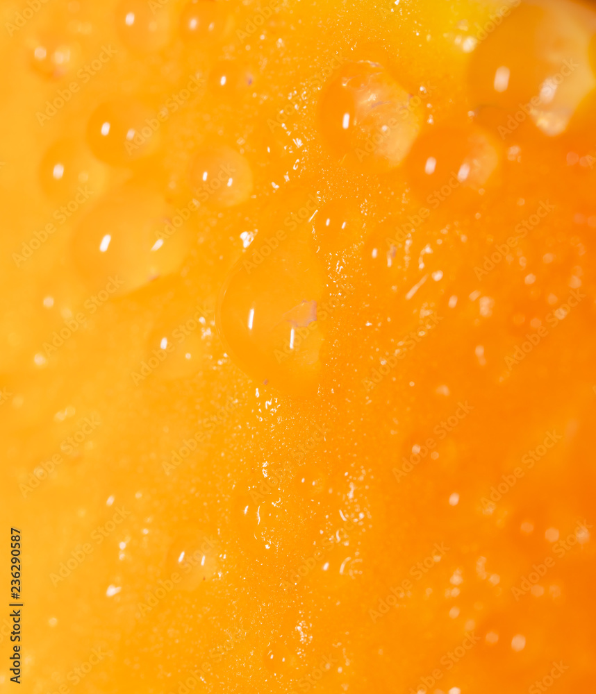 Drops of juice on pumpkin pulp as abstract background Drops of juice on pumpkin pulp as abstract background