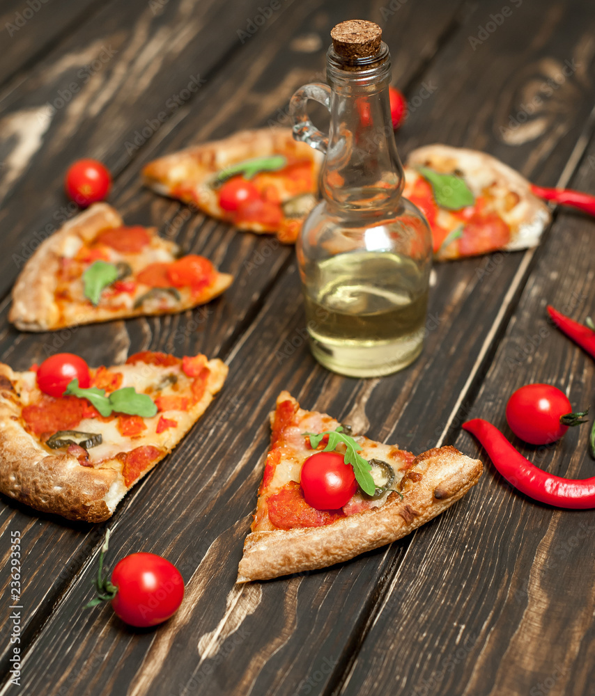 pizza on wood table with ingredients pizza on wood table with ingredients