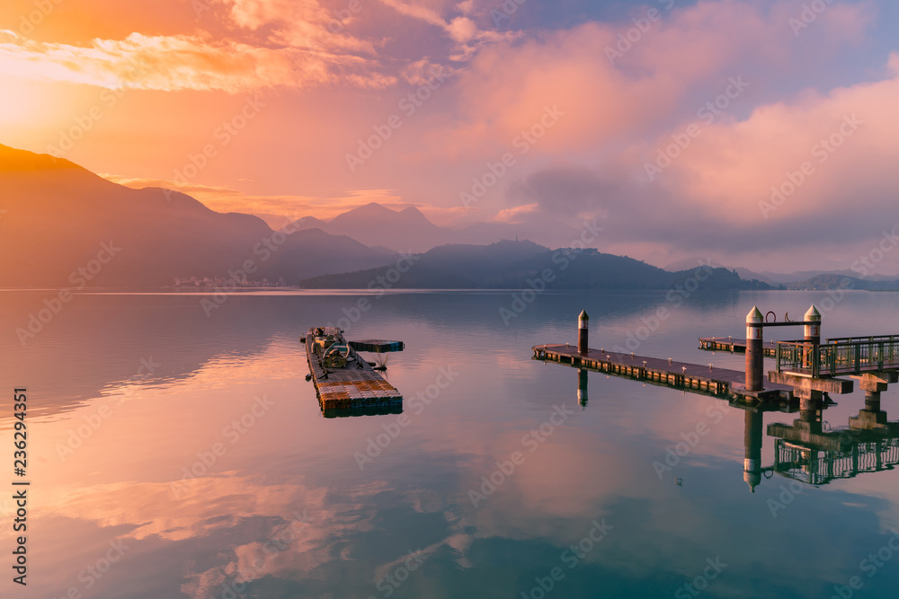 Fototapeta premium Beautiful sky reflection over Sum Moon Lake, Taiwan natural landscape sunrise background