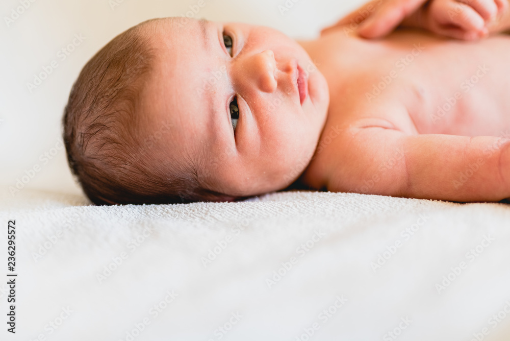Little baby resting relaxed lying thoughtful. Little baby resting relaxed lying thoughtful.