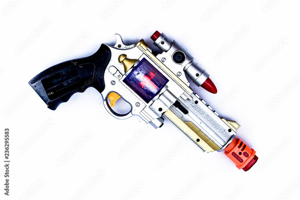 Junagadh-Gujarat-India-November,17th,2018-Close up of toy guns isolated on white use batteries in them. Junagadh-Gujarat-India-November,17th,2018-Close up of toy guns isolated on white use batteries in them.