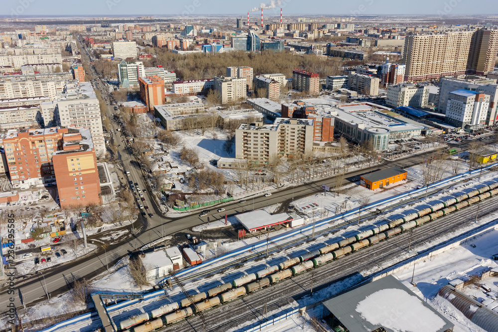 Train between old and new districts of Tyumen city