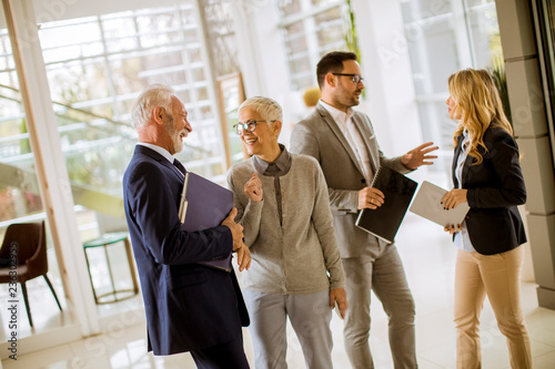 Group of smiling business p...