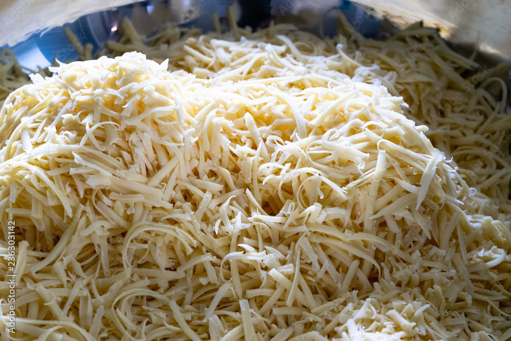 Sliced Cheese in the Bowl, Closeup Background Sliced Cheese in the Bowl, Closeup Background