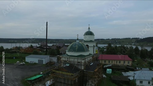 Construction of a new wooden Church Staroutkinsk Russia photo